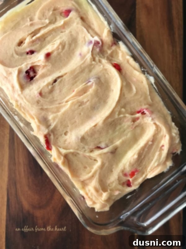 Sweet Cherry Cheese Bread 4 Ingredients for Cherry Cheese Bread including cream cheese, butter, sugar, eggs, and maraschino cherries, prepped for baking