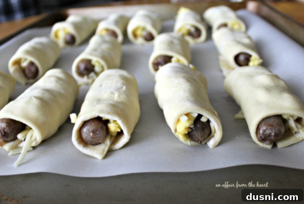 Rolling up the puff pastry around the fillings