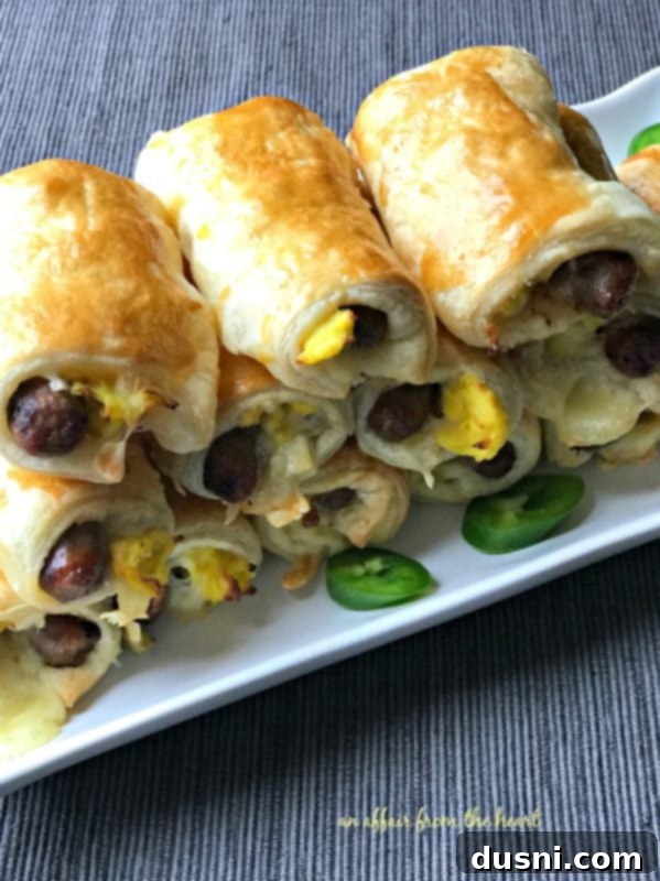 Baked Southwestern Sausage Brunch Roll-Ups on a baking sheet