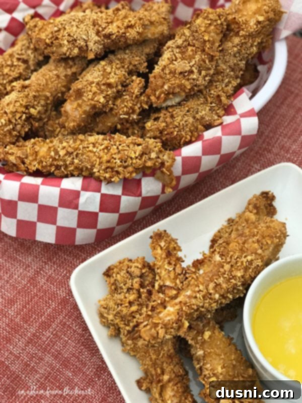 Zesty Oven-Baked Chicken Strips 5 A basket of Spicy Baked Chicken Tenders ready to be served.