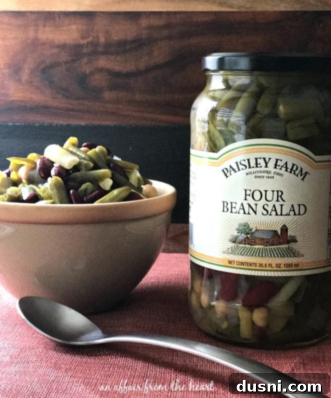 Zesty Oven-Baked Chicken Strips 7 A bowl of Paisley Farms Four Bean Salad.