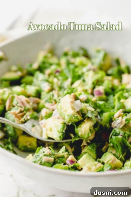 Creamy Avocado Tuna Bliss 10 A beautifully presented bowl of Avocado Tuna Salad, ready to be served.