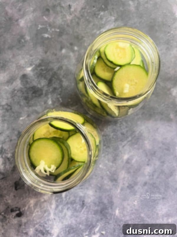 Step-by-step image of sliced cucumbers and onions being packed into a jar