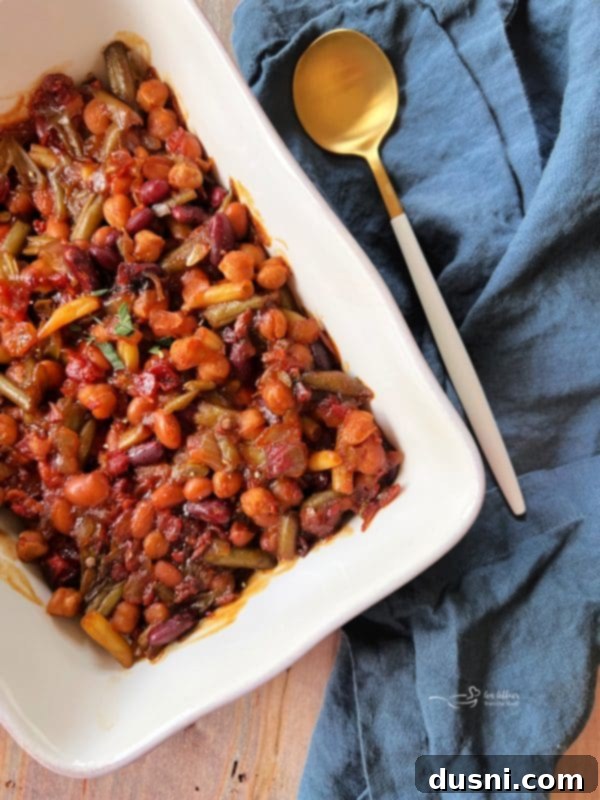 Hearty Five-Bean Bake 2 Five Bean Baked Beans in a white casserole dish