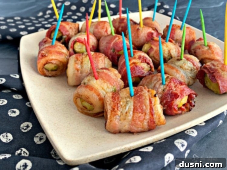 Perfectly Crispy Air Fryer Bacon 4 Bacon Wrapped Hot Brussels Sprouts close up
