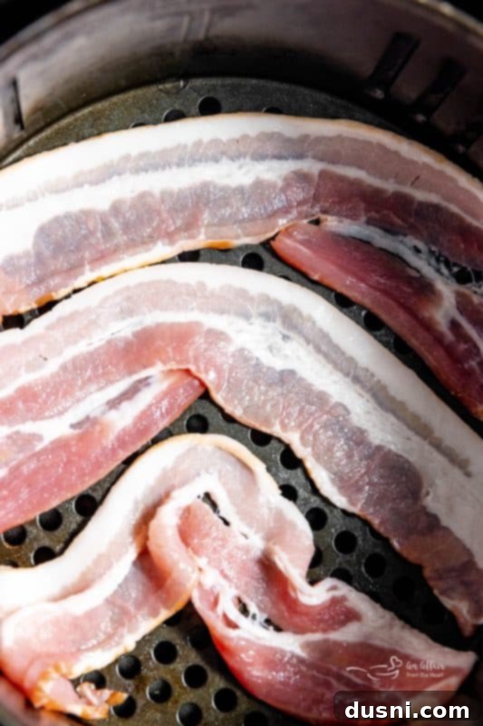 Perfectly Crispy Air Fryer Bacon 9 Air Fryer Bacon step 3: Crispy bacon in the air fryer basket