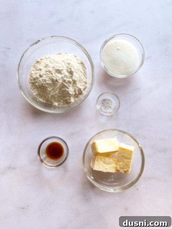 Buttery Shortbread Ice Cream Cookie Cake 6 Variety of ingredients laid out for baking the cookie cake.