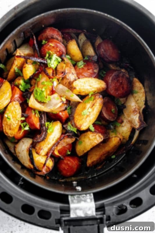 Air Fryer Sausage and Potatoes, seasoned and ready for cooking