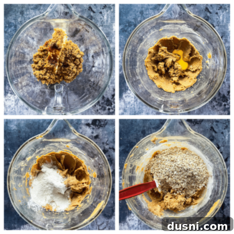 Empty baking pan being lined with aluminum foil for PB&J bars