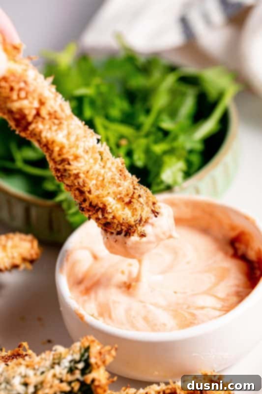 Crispy Air Fryer Zucchini Fries 14 Cooked Air Fryer Zucchini Fries in the air fryer