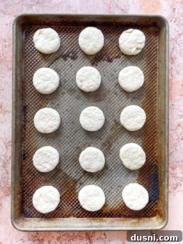 Golden Buttermilk Clouds 10 Biscuits being cut from dough with a round cutter