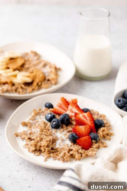 Close-up of a spoon digging into creamy Instant Pot Cinnamon Oatmeal.