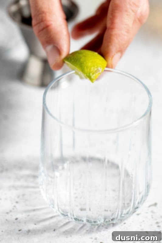 Apple Cider Margarita 5 Maldon salt flakes spread on a small plate for rimming a glass.