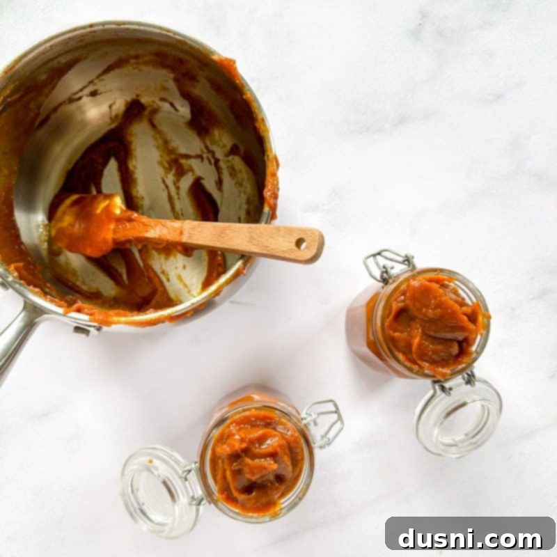 Cooked pumpkin butter cooling down before being transferred to jars.