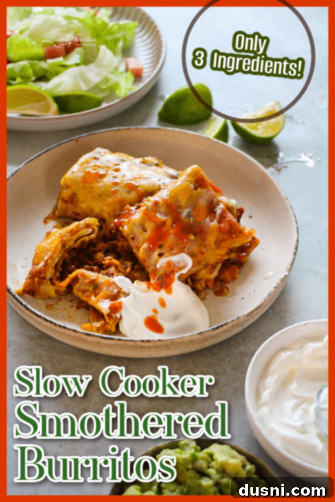 Comforting Slow Cooker Smothered Burritos 13 A top-down view of Slow Cooker Smothered Burritos in a slow cooker, garnished and ready.