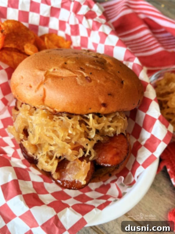 BBQ Hot Dogs and Sauerkraut 13 BBQ Smoked Sausage Sandwiches on a bun with kraut, a delicious alternative.