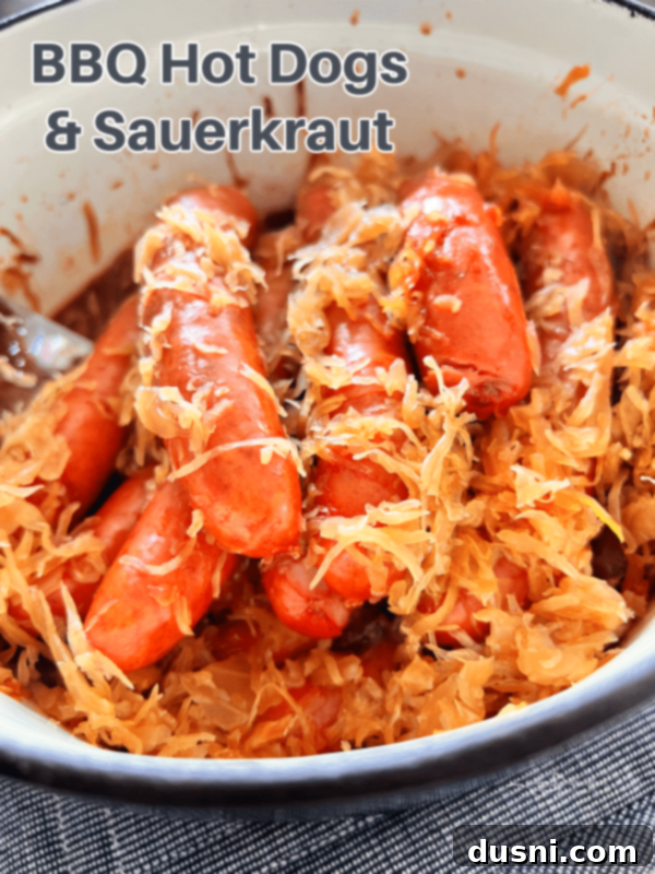 BBQ Hot Dogs and Sauerkraut 16 Hero image of BBQ Hot Dogs with Sauerkraut, perfectly plated.