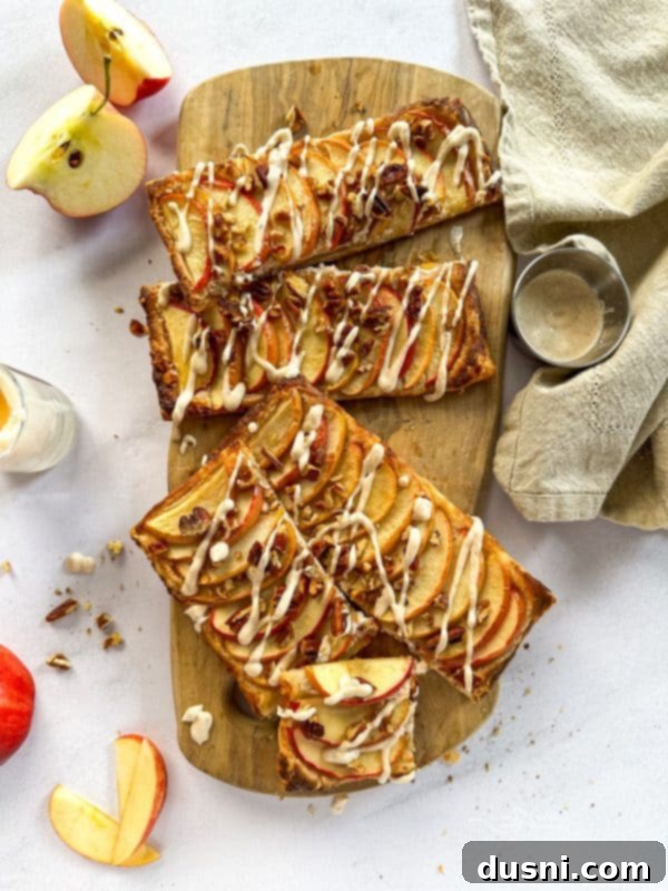 Simple Puff Pastry Apple Tarts 2 Overhead of Puff Pastry Apple Tarts on a Wood board