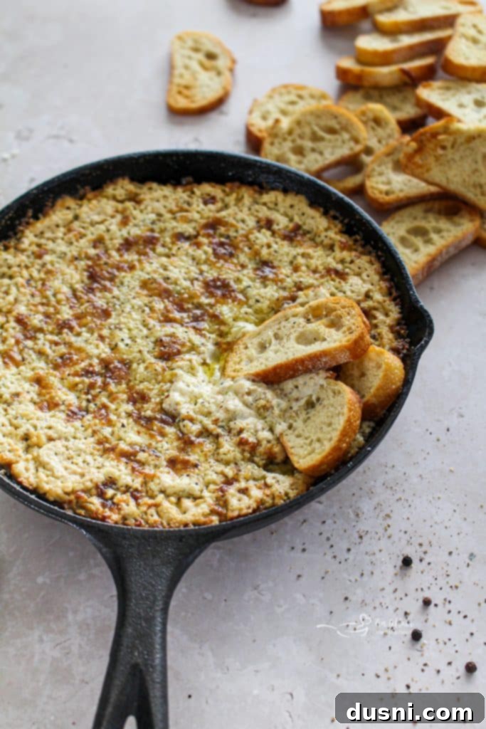 Warm & Bubbly Onion Dip 2 Golden brown baked onion dip served with toasted baguette slices