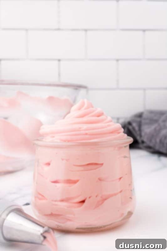 Ghoulish Grey Matter Cupcakes 19 A collection of Halloween Brain Cupcakes artfully arranged on a serving tray or cutting board. The varied angles highlight the delicate piping of the brain frosting and the dark, glistening edible blood, creating a truly unsettling yet appealing display of spooky Halloween desserts.