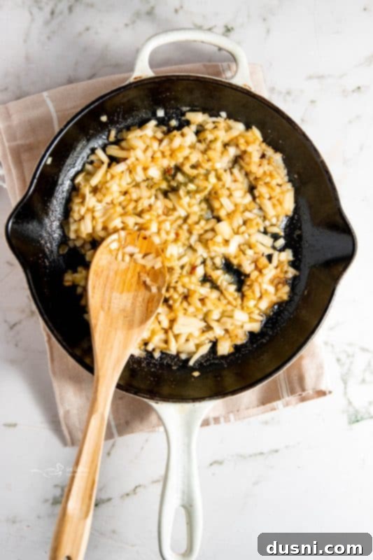 Zesty Lemon Chicken Dinner in 30 Minutes 8 Sautéing Onions and Garlic in Butter
