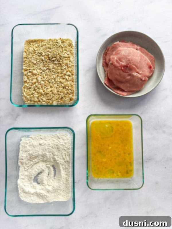 Tenderloin Crunchwich 8 Seasoned cracker crumbs in a dish, ready for breading.