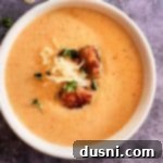 French Sauerkraut soup in a white bowl