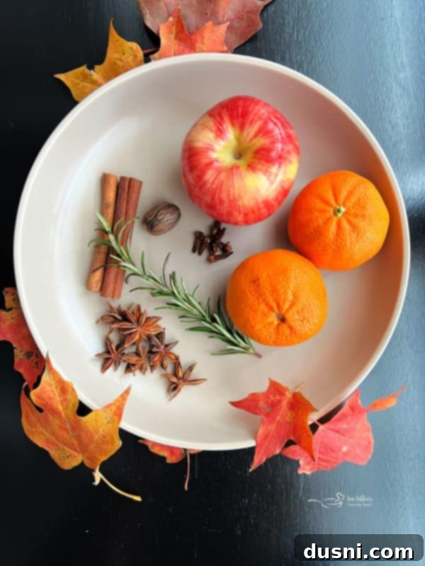 Mis Kokulu Sonbahar Demlemesi Nasıl Hazırlanır 3 Autumn Simmer Pot ingredients on a cutting board