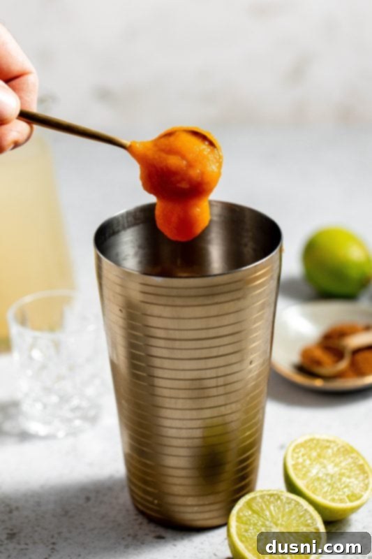 Step 3: Add pumpkin puree to the shaker.