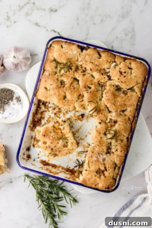 Freshly baked focaccia bread with rosemary and garlic
