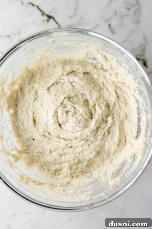 Step 3: Mixing focaccia dough in a bowl
