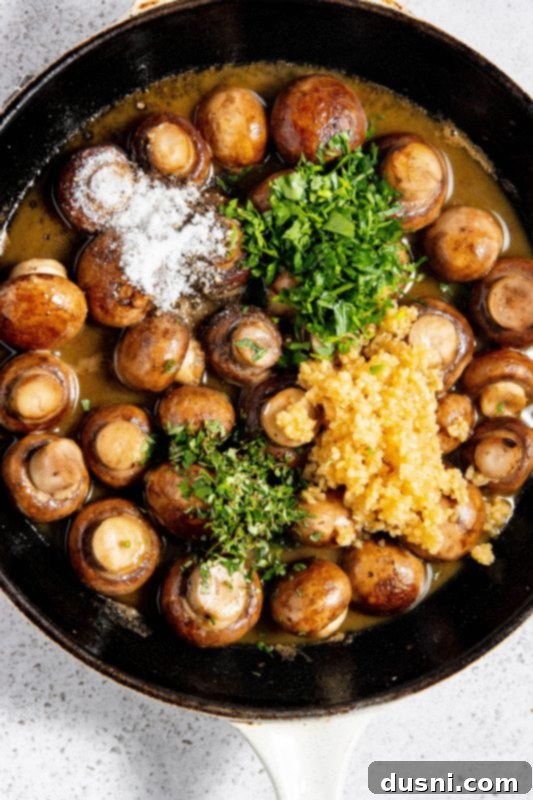 Velvety Bacon Mushroom Skillet 12 Garlic, parsley, thyme, salt, and pepper added to mushrooms in the skillet