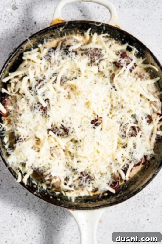 Velvety Bacon Mushroom Skillet 16 Mozzarella and Parmesan cheese sprinkled over the creamy mushrooms and bacon, before broiling