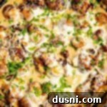 Velvety Bacon Mushroom Skillet 24 Extreme close up of Creamy Mushrooms with Bacon, garnished with parsley