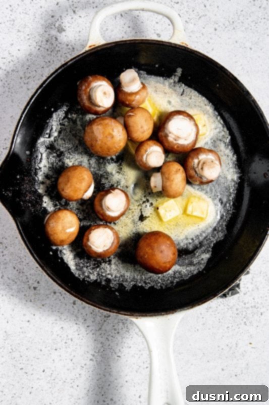 Velvety Bacon Mushroom Skillet 10 Mushrooms sautéing in butter and bacon fat until golden brown