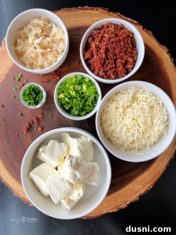 A close-up of the cheese ball with a serving knife, highlighting the dense, creamy texture and the vibrant greens of the onion and chives.