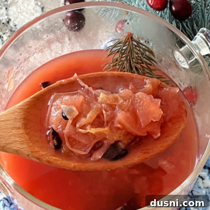 Holiday simmer pot ingredients arranged on a cutting board.