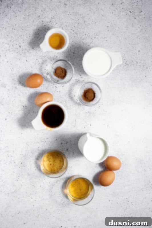 Homemade Blender Eggnog 6 A clear glass of homemade eggnog with a fresh garnish, ready to be enjoyed.