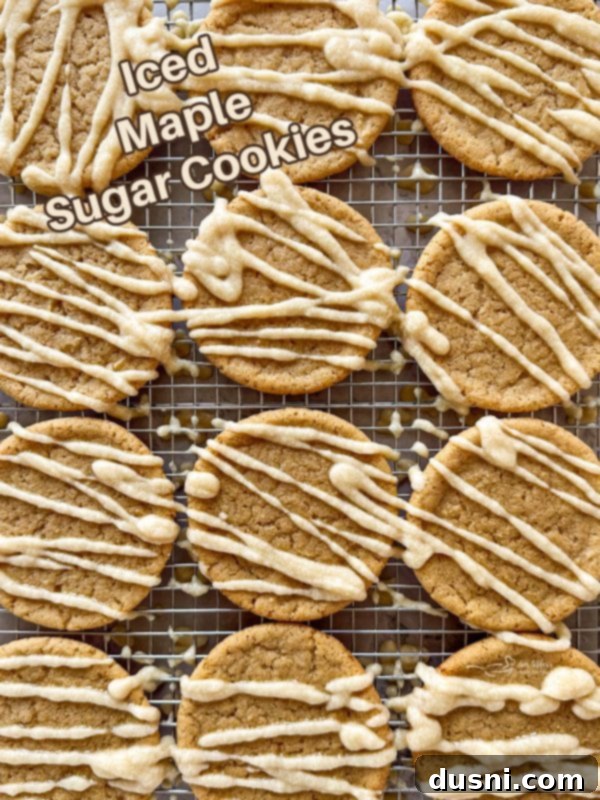 Hero shot of a plate of Iced Maple Sugar Cookies, beautifully glazed and ready to be enjoyed.