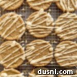 close up of Iced Maple Sugar Cookies close up on a cooling rack