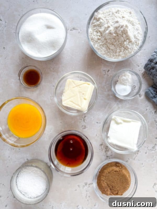 Hand drizzling maple icing over a freshly baked maple sugar cookie