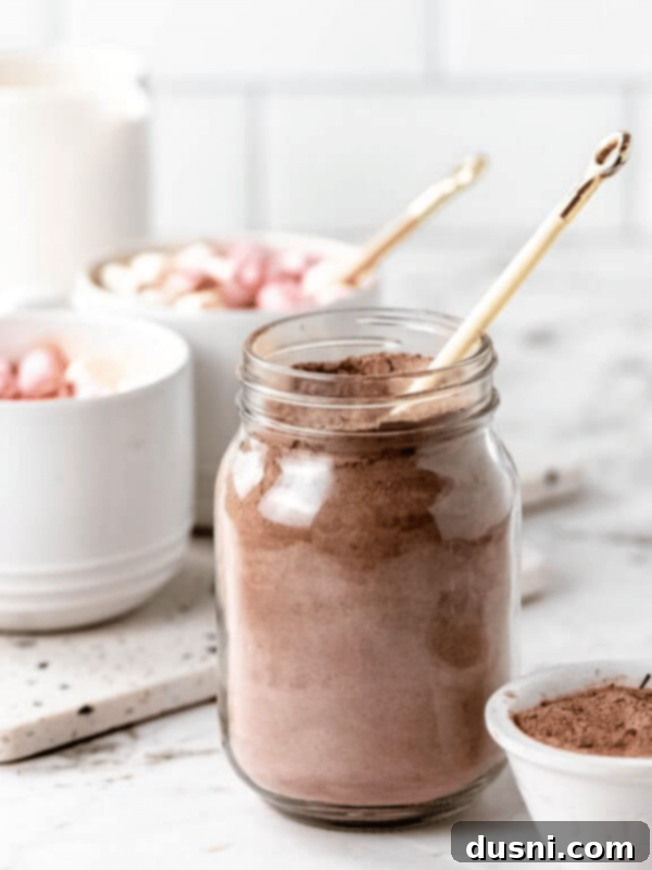 Hot Cocoa Thumbprint Delights 15 Homemade Hot cocoa mix in a mason jar, perfect for gifting.