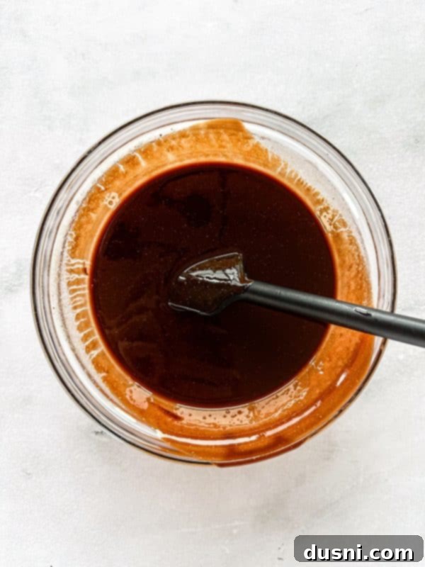 Hot Cocoa Thumbprint Delights 6 First step: Melting butter and chocolate in a bowl.