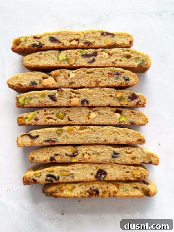 A plate of Holiday Biscotti, some dipped in chocolate.