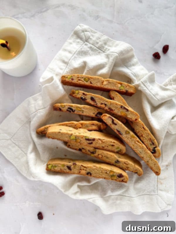 Close-up of Holiday Biscotti showing cranberries, pistachios, and white chocolate.