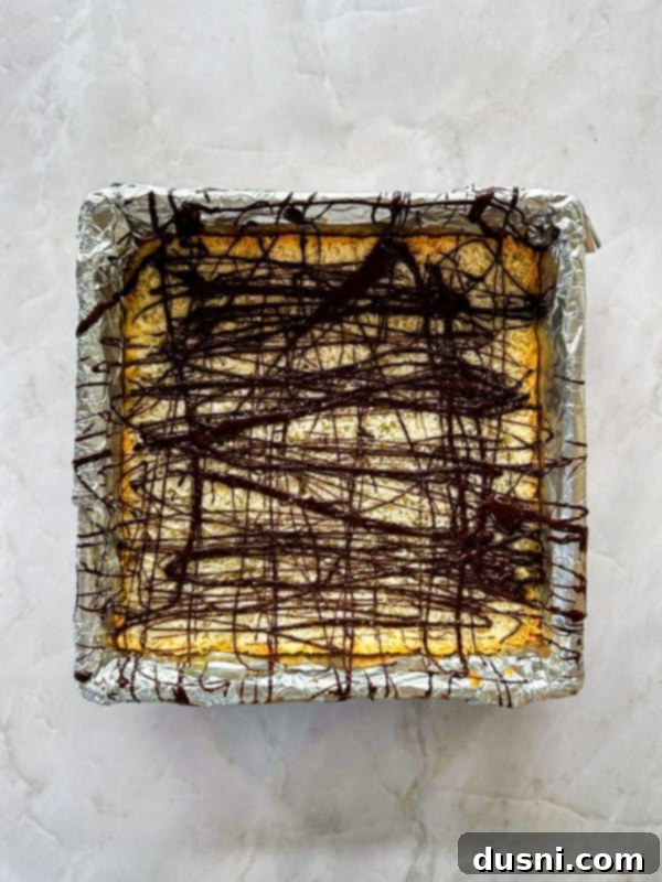 Decadent Coconut Macaroon Blondies 12 Baked Coconut Macaroon Blondies in the pan