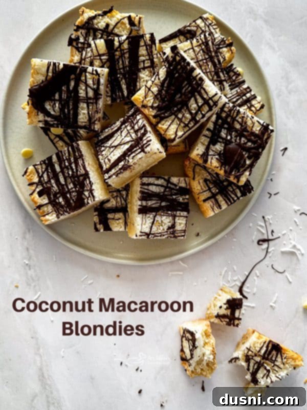 Decadent Coconut Macaroon Blondies 18 Large image of Coconut Macaroon Blondies on a white surface