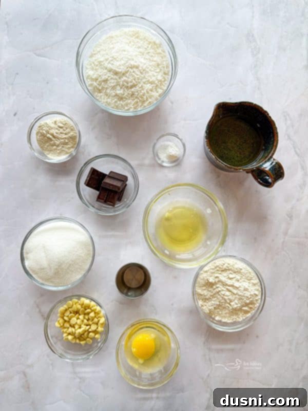 Decadent Coconut Macaroon Blondies 4 Close-up of baked Coconut Macaroon Blondies with a chocolate drizzle