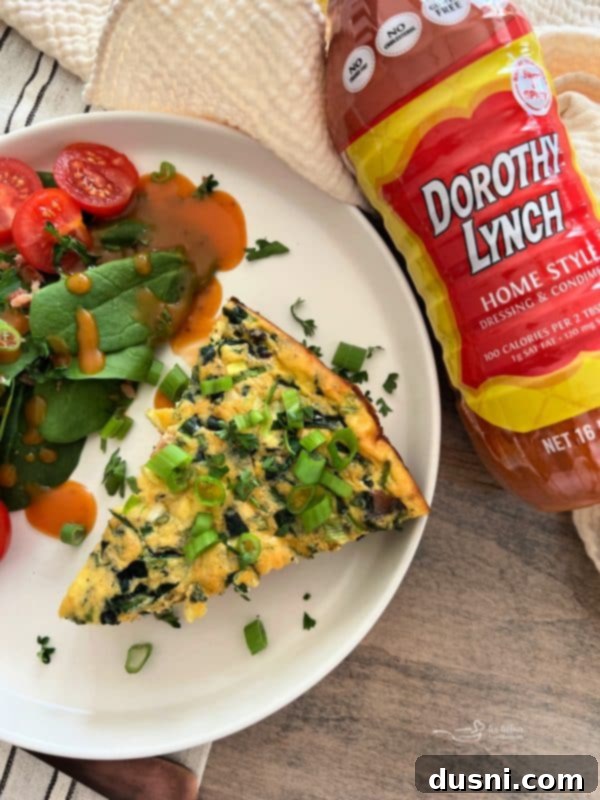 Dorothy's Hearty Bacon & Potato Frittata 3 Close-up of Dorothy's Bacon and Potato Frittata with crispy bacon and herbs