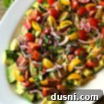 Overhead of Deconstructed Guacamole Salad with all fresh ingredients.